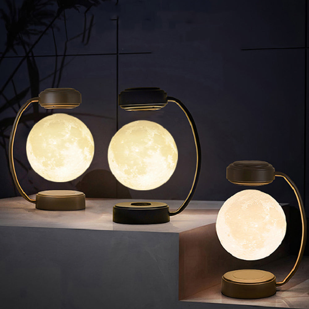 Decorative moon-shaped lamps on a dark background